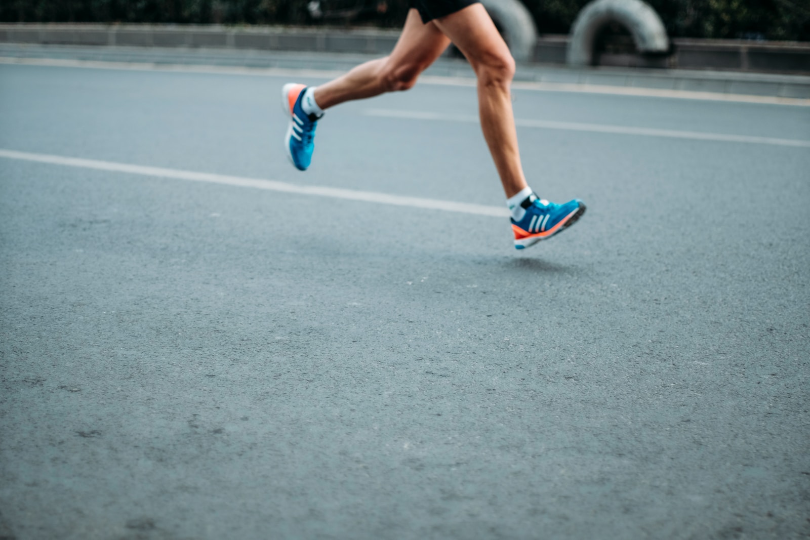 pair of blue-and-white running shoes